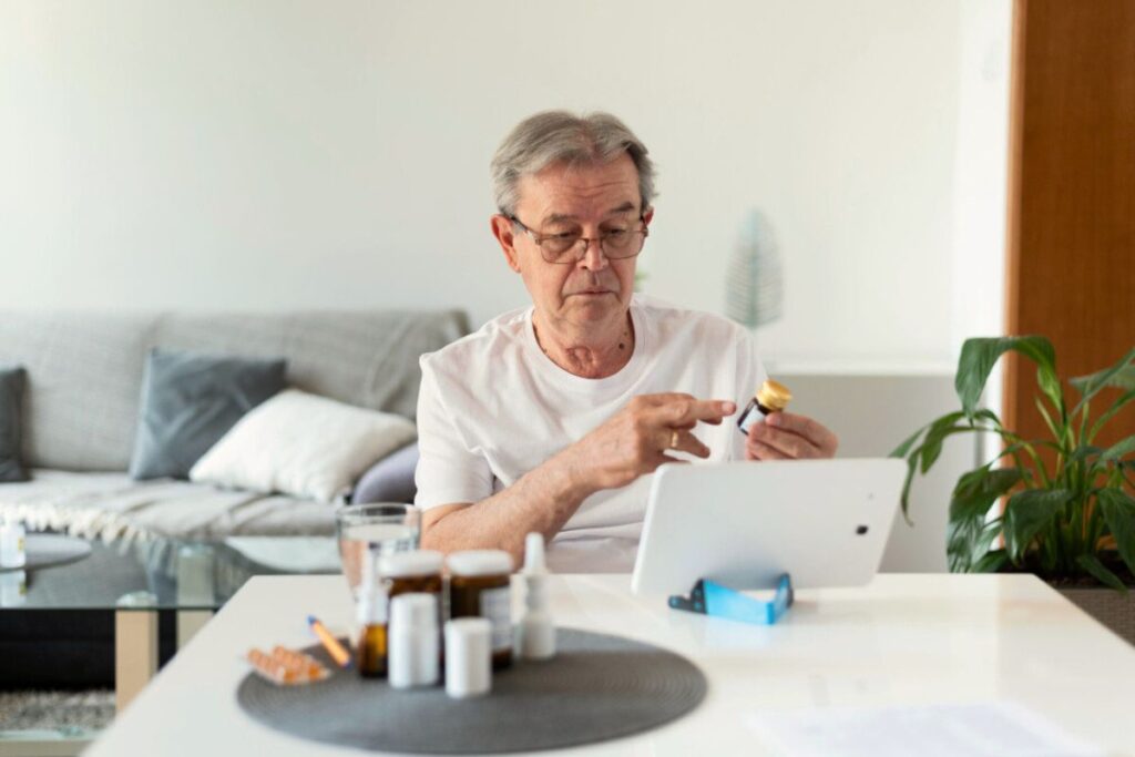 elder checking his medications